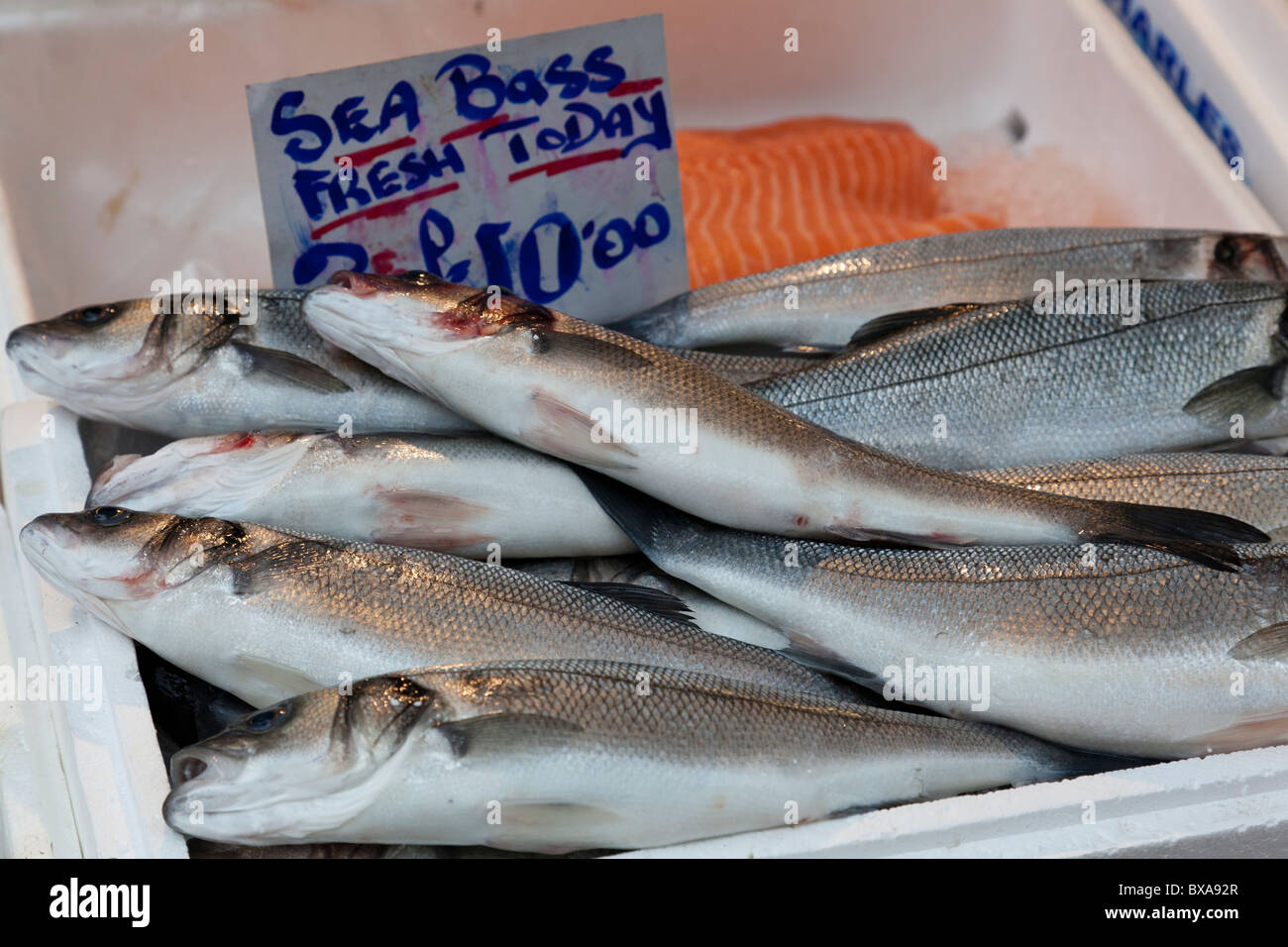 Fresh sea bass for sale on a market stall, Kingston, Surrey, England Stock Photo Alamy