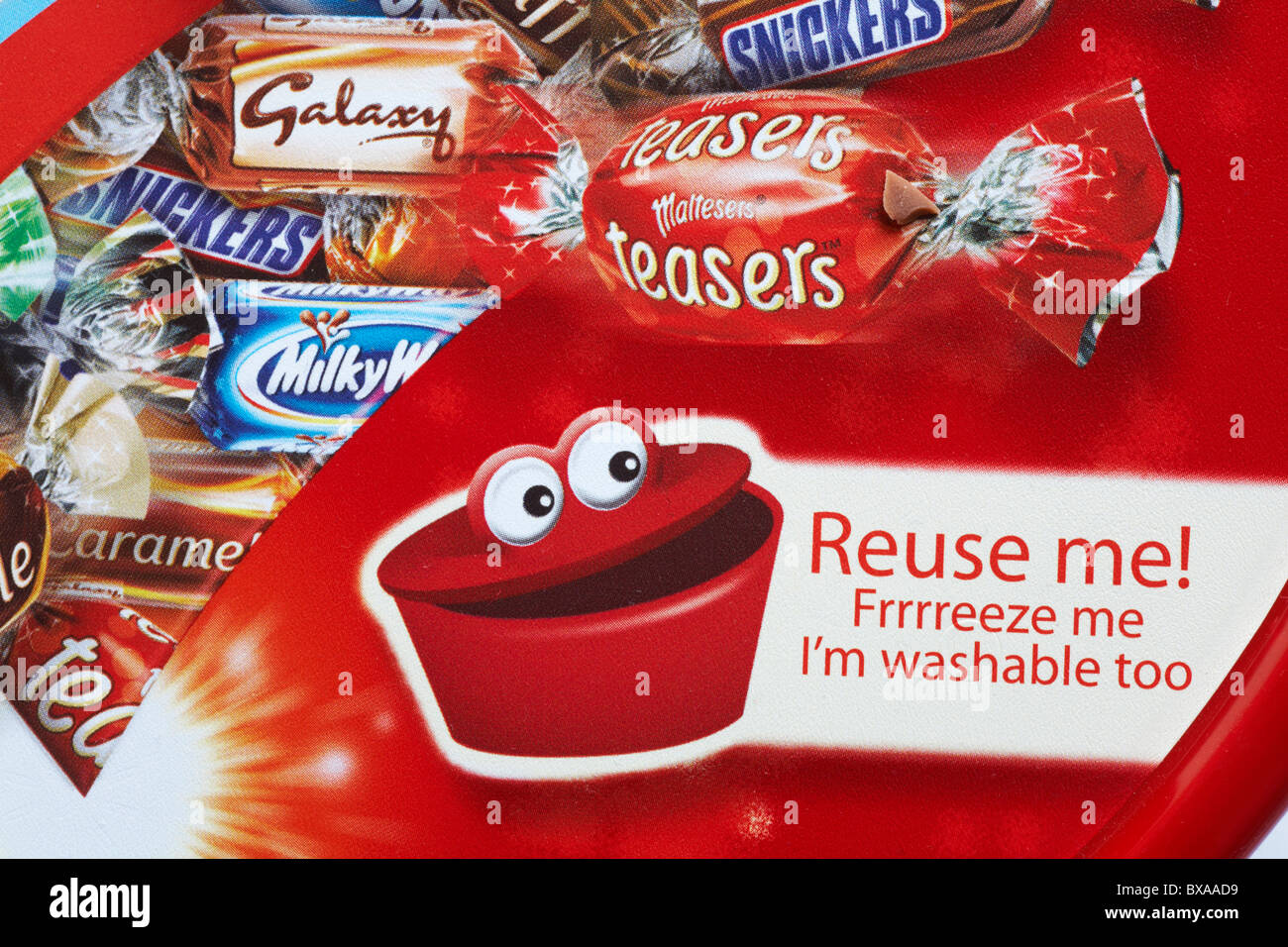 Reuse me Frrrreeze me I'm washable to - message on top of tin of Celebrations chocolates Stock Photo