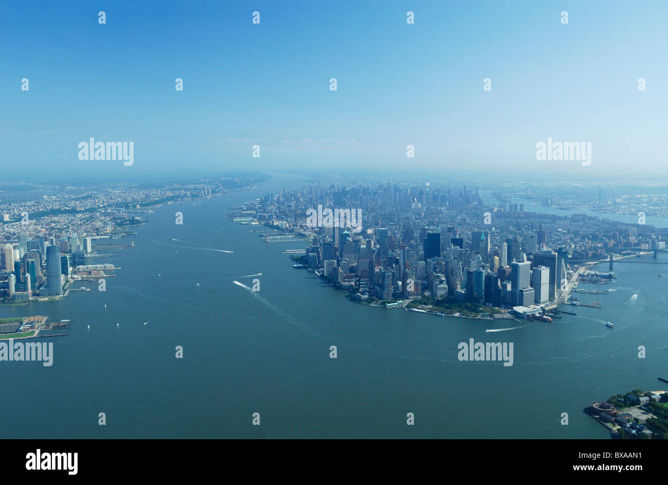 Aerial view Hudson river, Jersey city (left) and South Manhattan (right) during hot summer, New York state, North America, USA Stock Photo