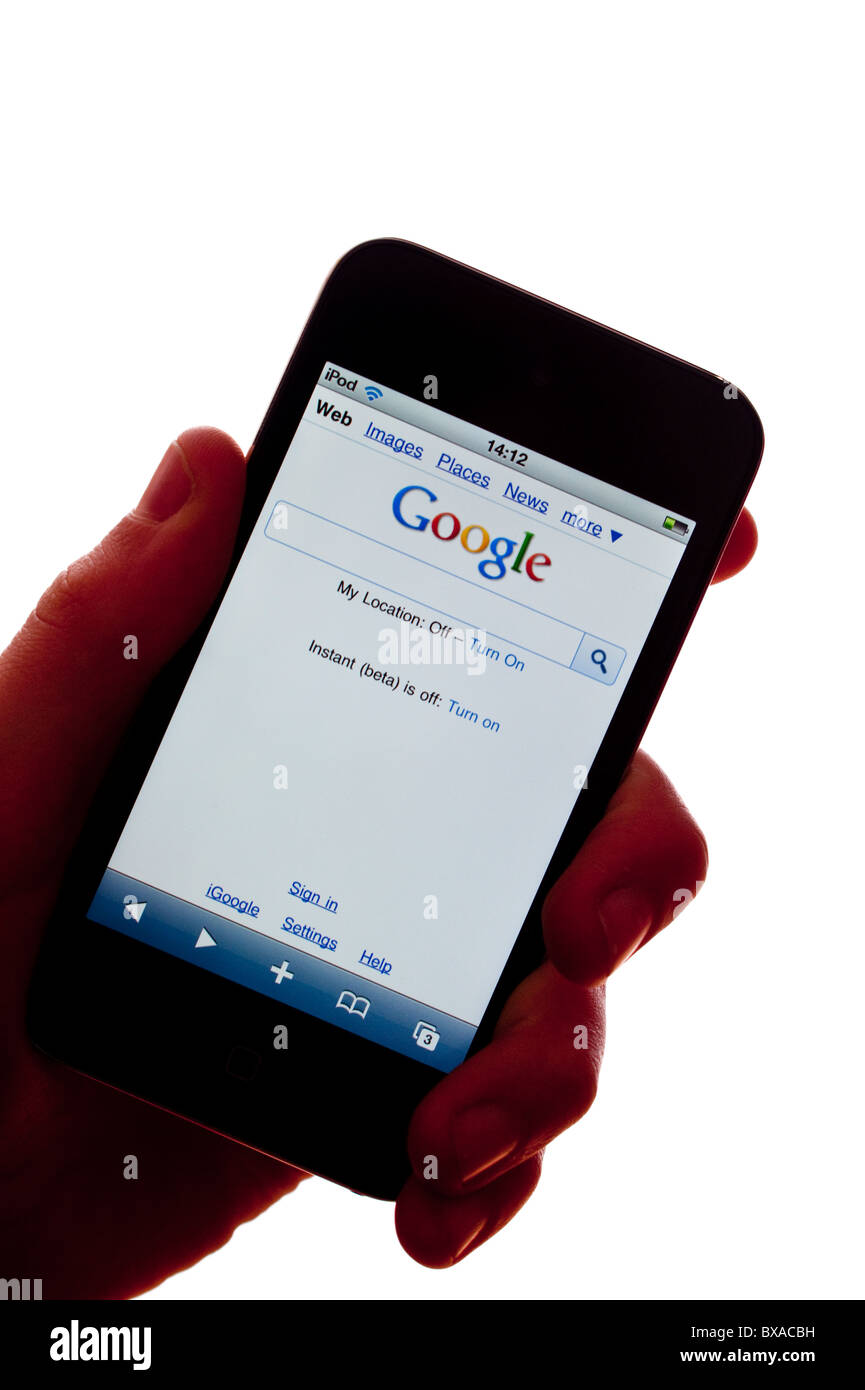 The new Apple Ipod touch 4th generation 4G 32gb media player with internet connection showing Google search engine Stock Photo