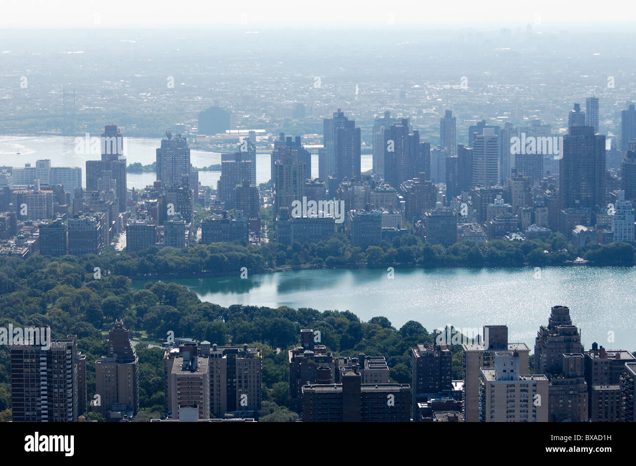 Aerial of Upper West/East side, and reservoir J Kennedy in Central park, during heatwave in hot summer, Manhattan, New York city Stock Photo