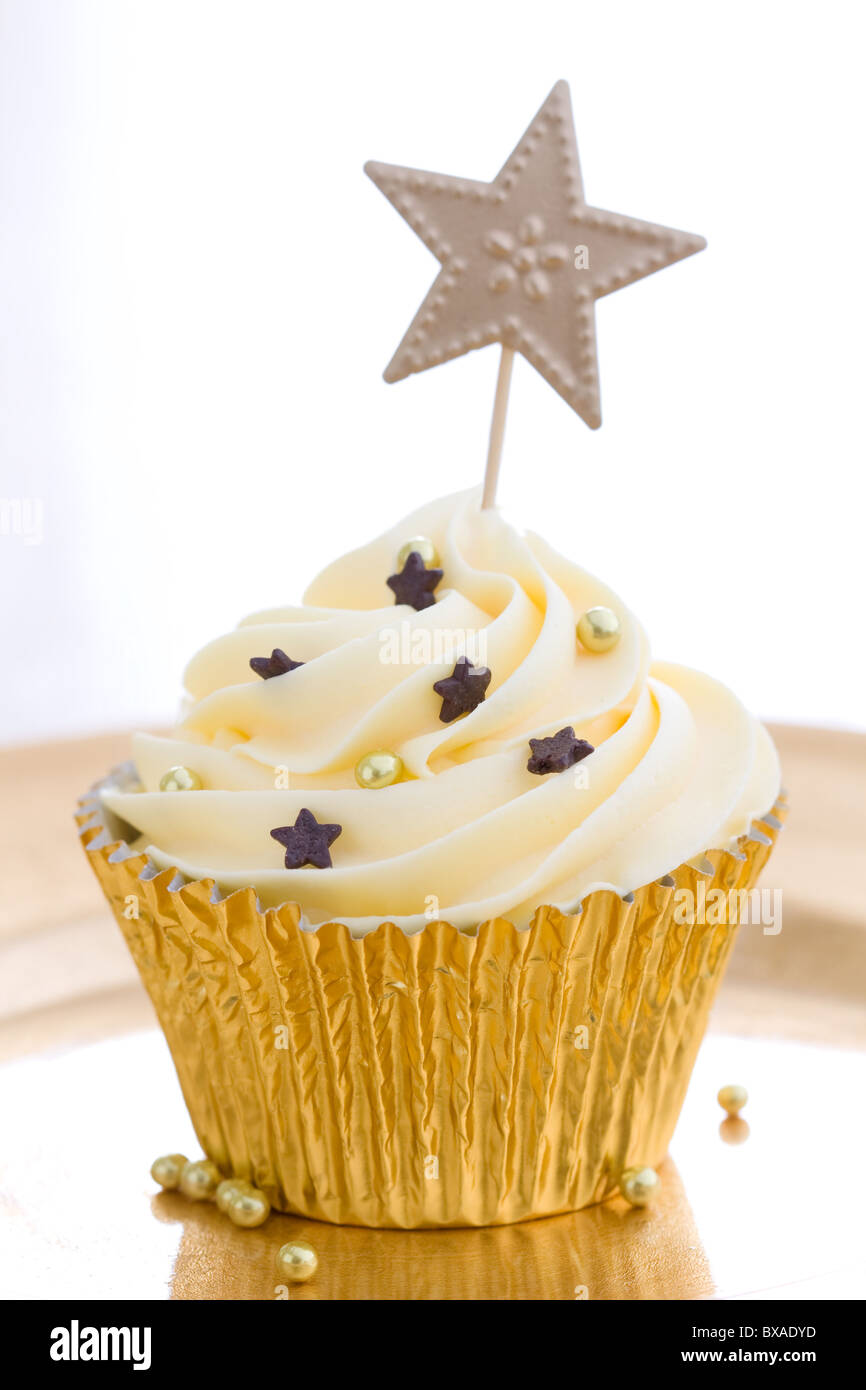 Golden cupcake Stock Photo