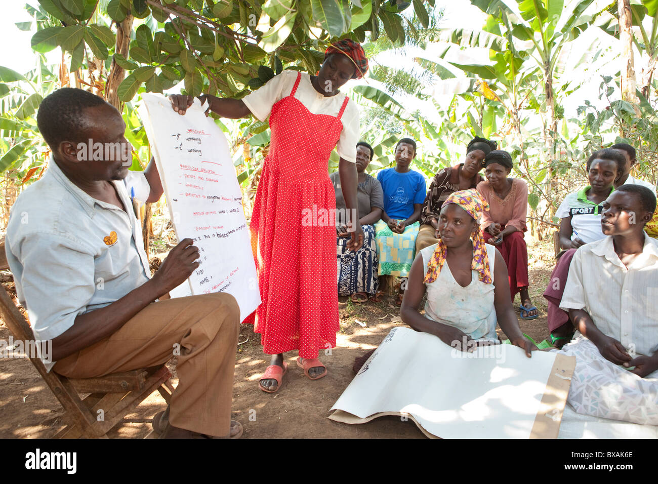 Villagers attend a community meeting in Buwanyanga Village - Sironko, Eastern Uganda, East Africa. Stock Photo