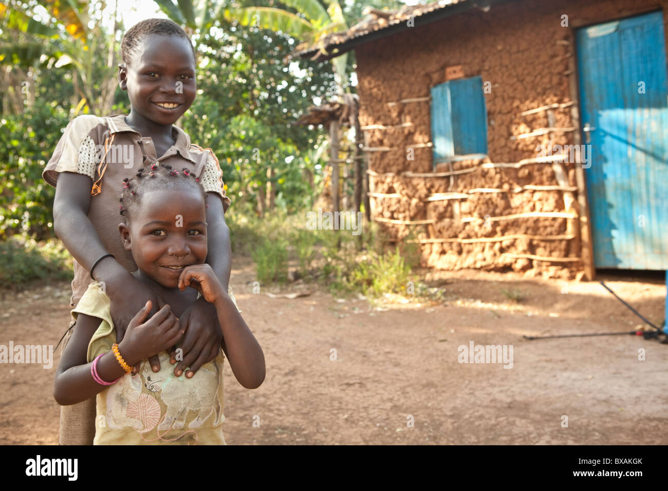 A brother and sister pose together in Buwanyanga Village - Sironko, Eastern Uganda, East Africa. Stock Photo