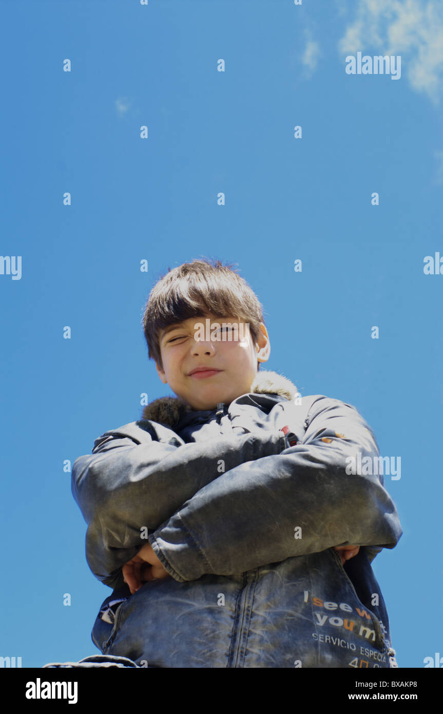 The boy against the dark blue sky Stock Photo - Alamy