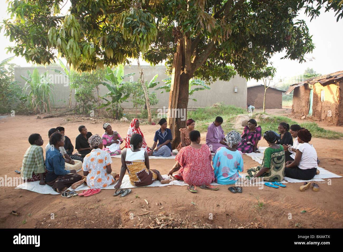 Women attend a community meeting in Nkono Village, a village outside Iganga town, Eastern Uganda, East Africa. Stock Photo
