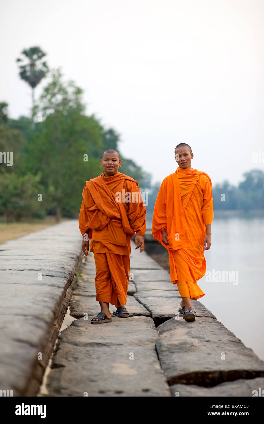 Two monks on a walk, Angkor, Cambodia Stock Photo