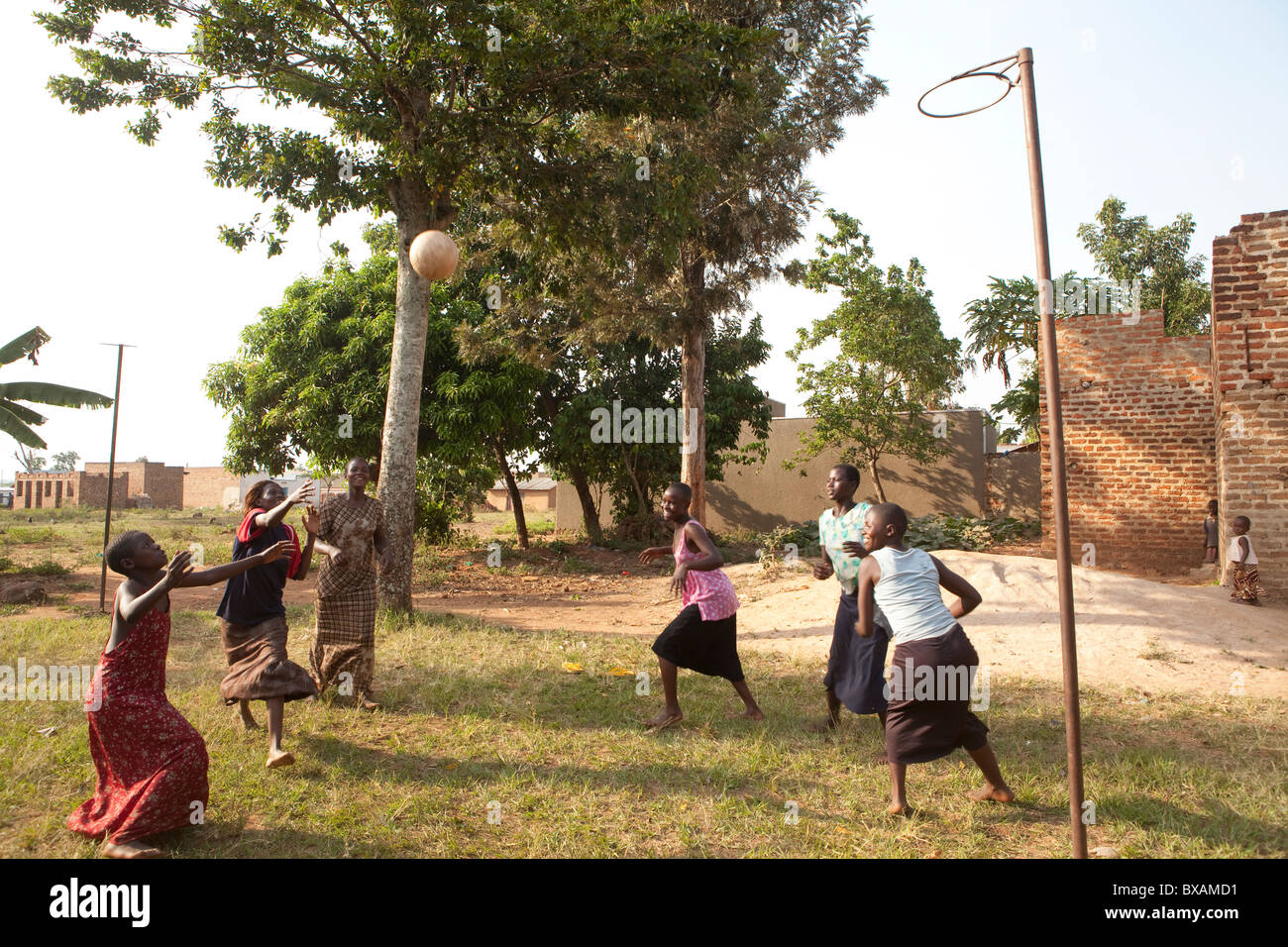Teenage girls play netball in Igamba village, Iganga District, Eastern Uganda, East Africa. Stock Photo