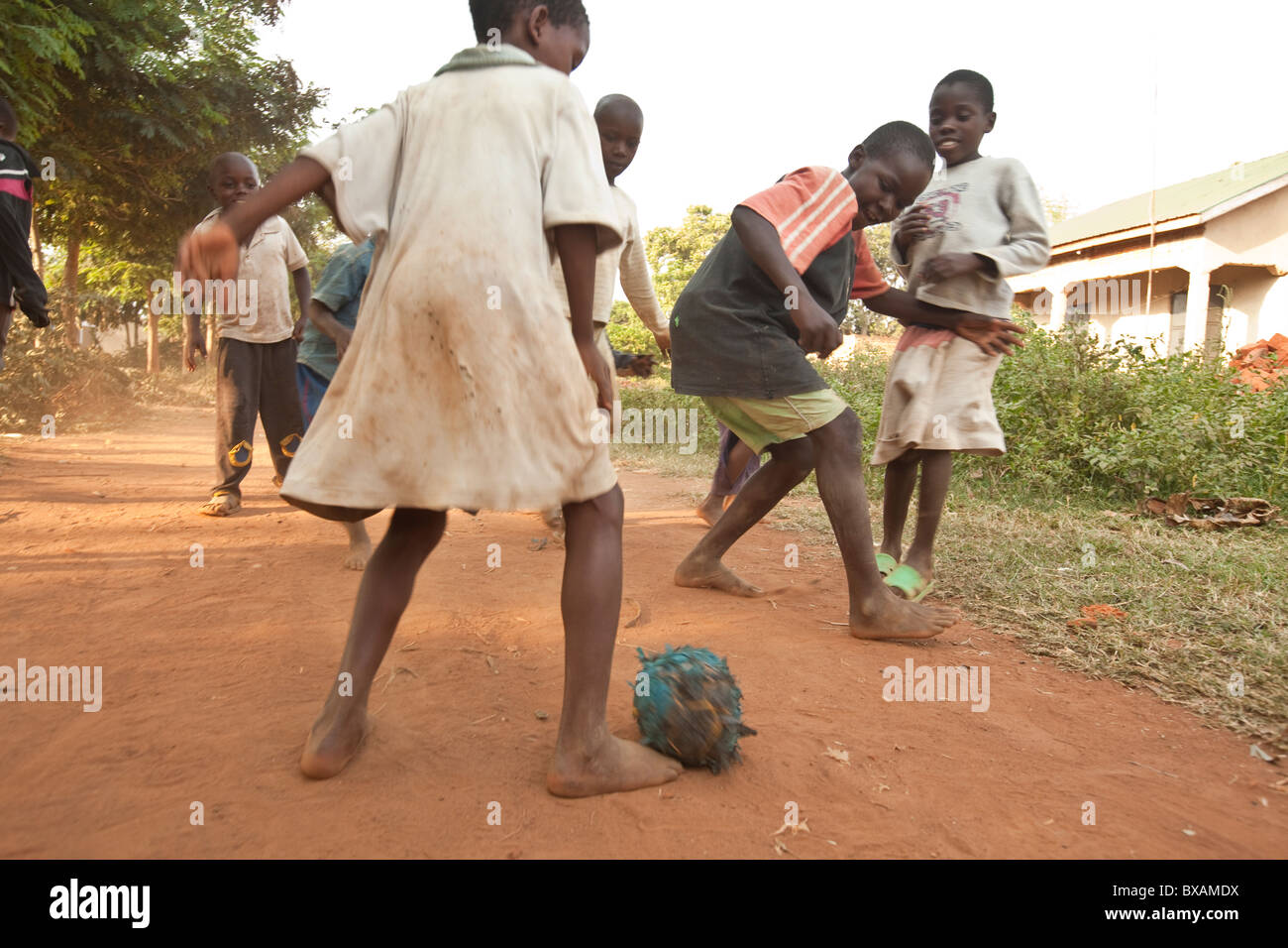 Children play football with a ball of rags in Igamba village, Iganga District, Eastern Uganda, East Africa. Stock Photo