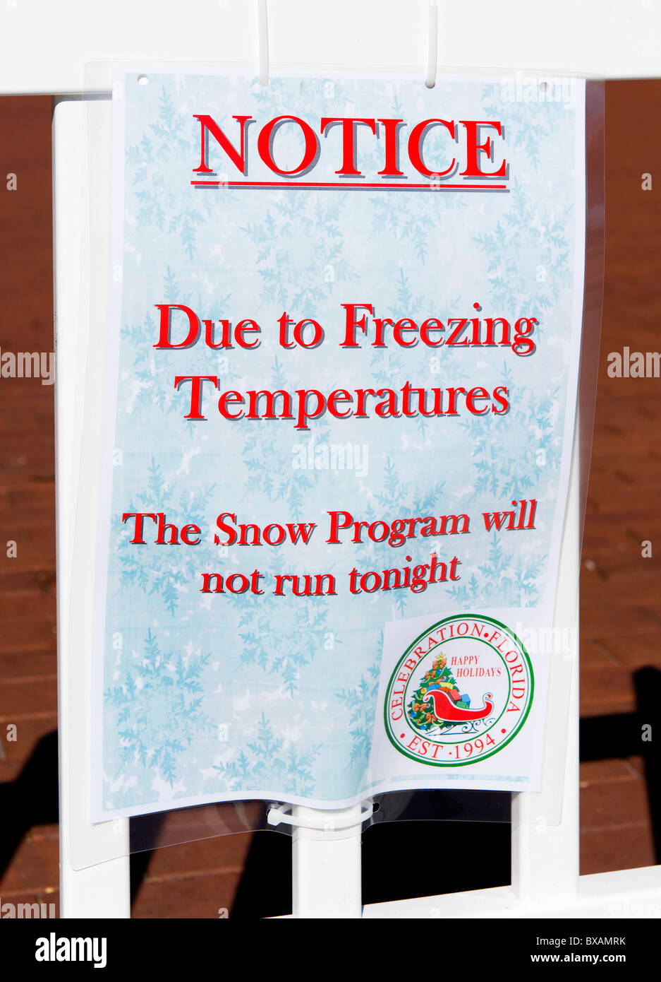Sign showing the cancellation of a Snow Program because of unusually cold weather, Celebration, Kissimmee, Orlando, Florida, USA Stock Photo