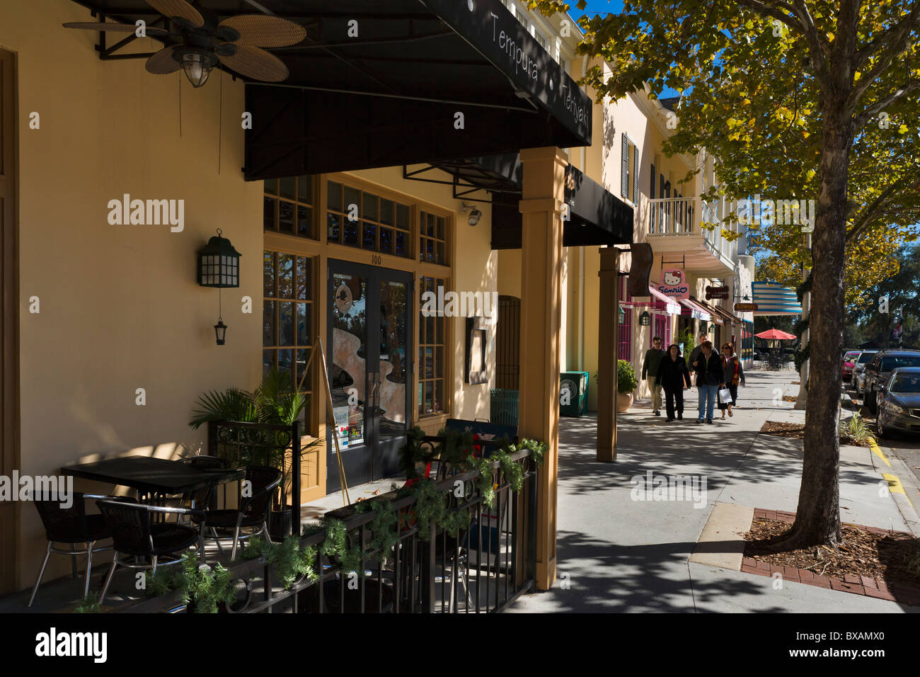 Shops and restaurants on the waterfront in the Disney purpose built township of Celebration, Kissimmee, Orlando, Florida, USA Stock Photo