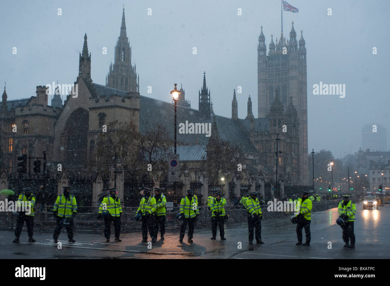 Police officers protecting the Houses of Parliament during a ...