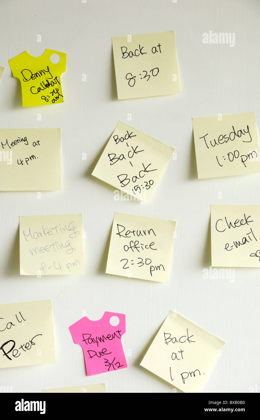 Stuck Up Notes Adhesive notes stuck on a wall Stock Photo - Alamy