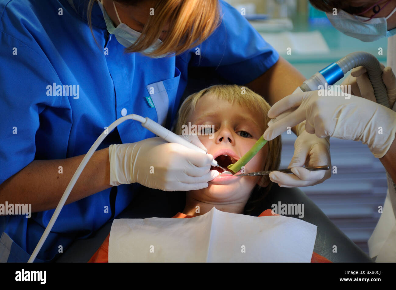 Stock photo of a 10 year old boy sitting in the Dentists chair Stock