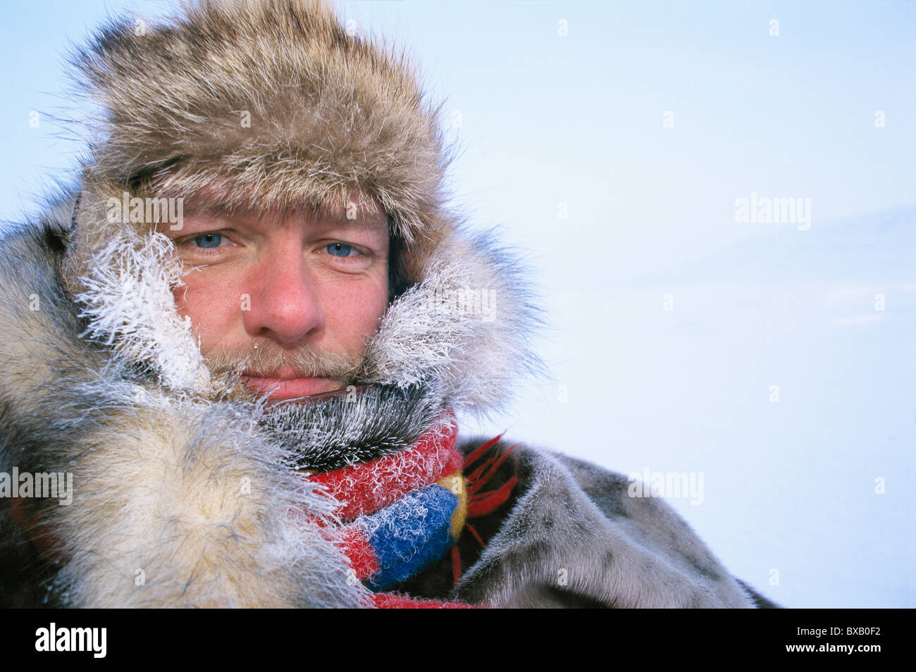 Portrait of man wearing fur hat Stock Photo