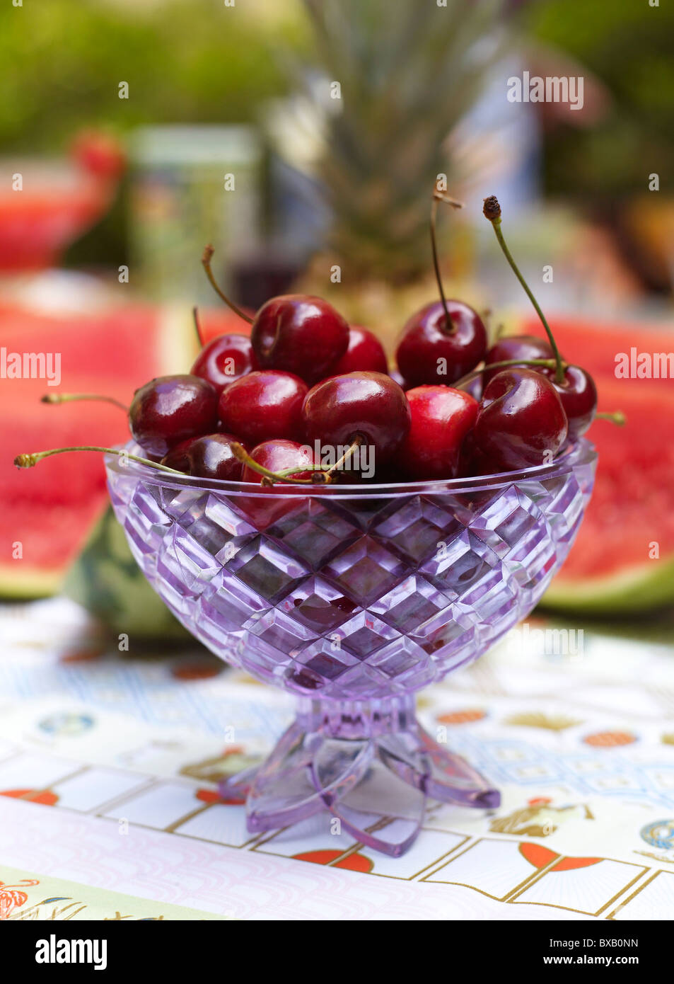 Cherries in fruit bowl Stock Photo Alamy