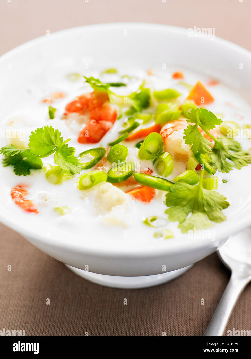 Shellfish soup with vegetables Stock Photo - Alamy
