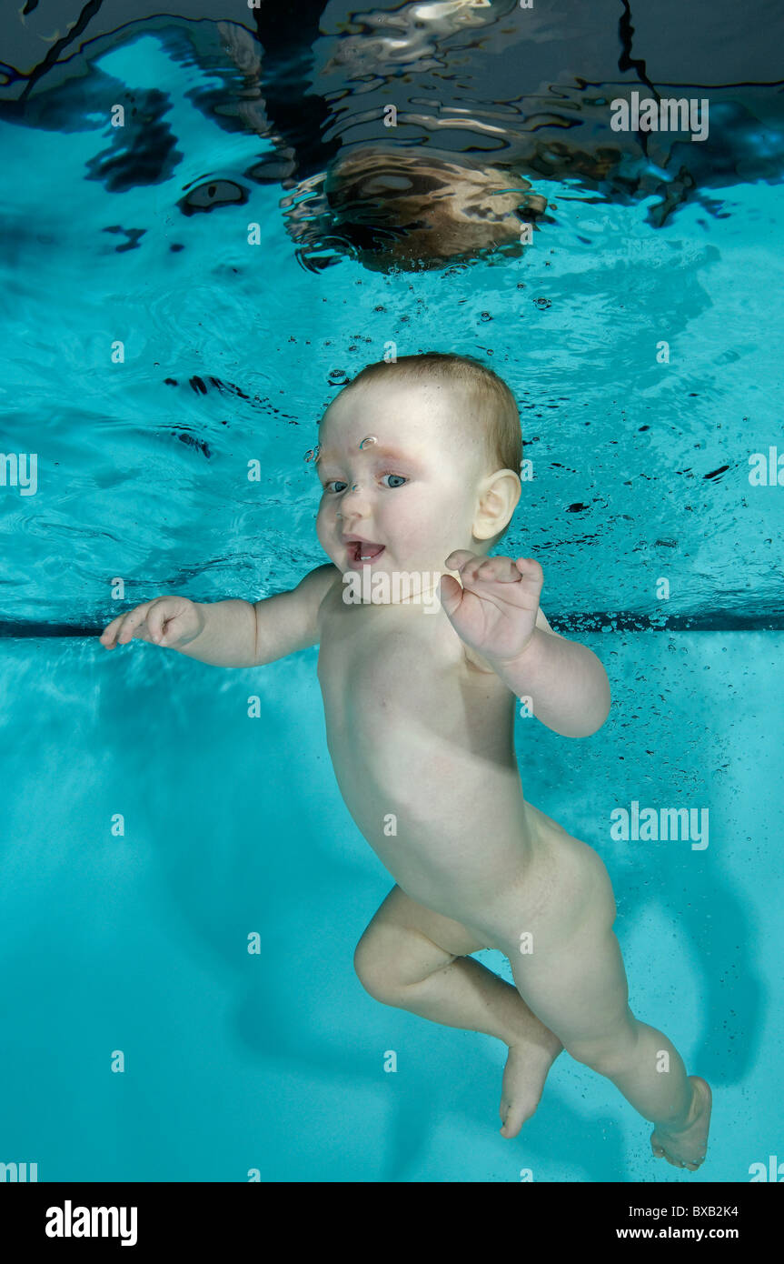Babyswimming, Baby diving underwater in Pool and having fun, Baby water