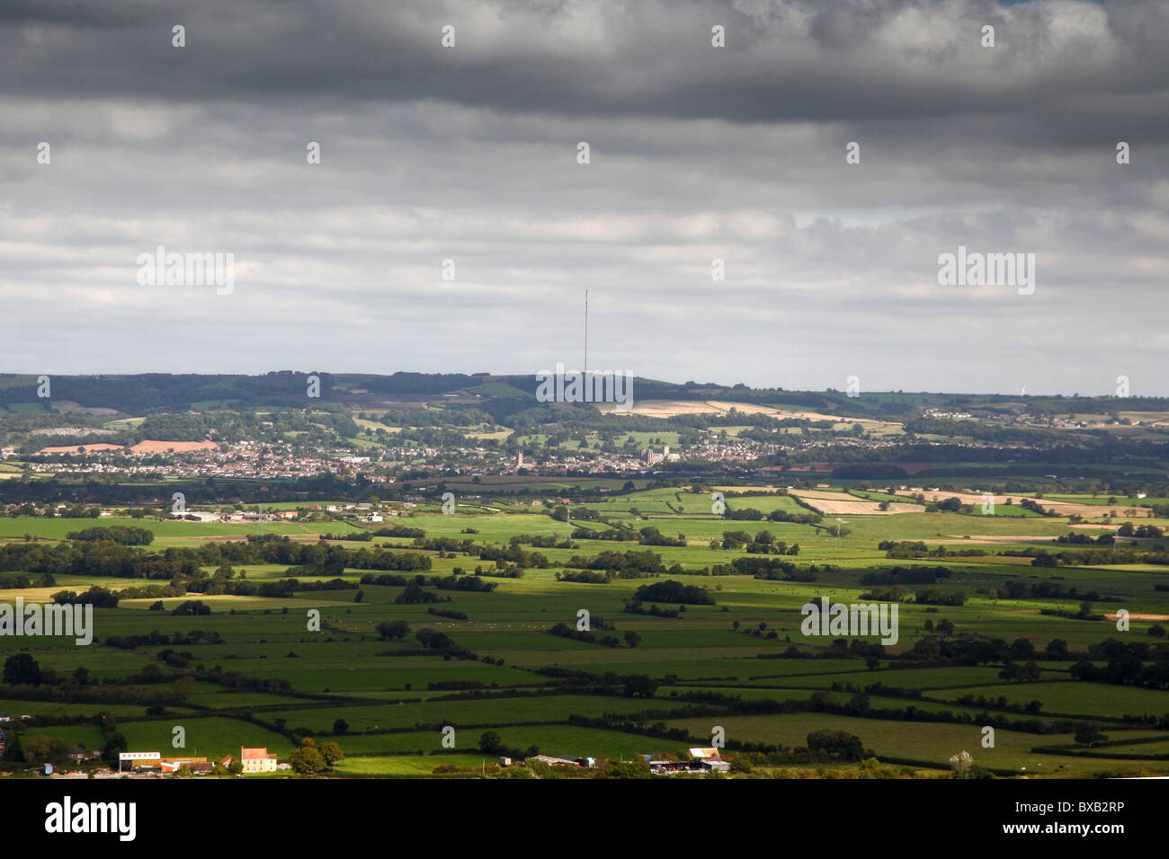 Looking N from Glastonbury Tor towards the Mendip Hills TV transmitter and the city of Wells with its cathedral, Somerset, UK Stock Photo