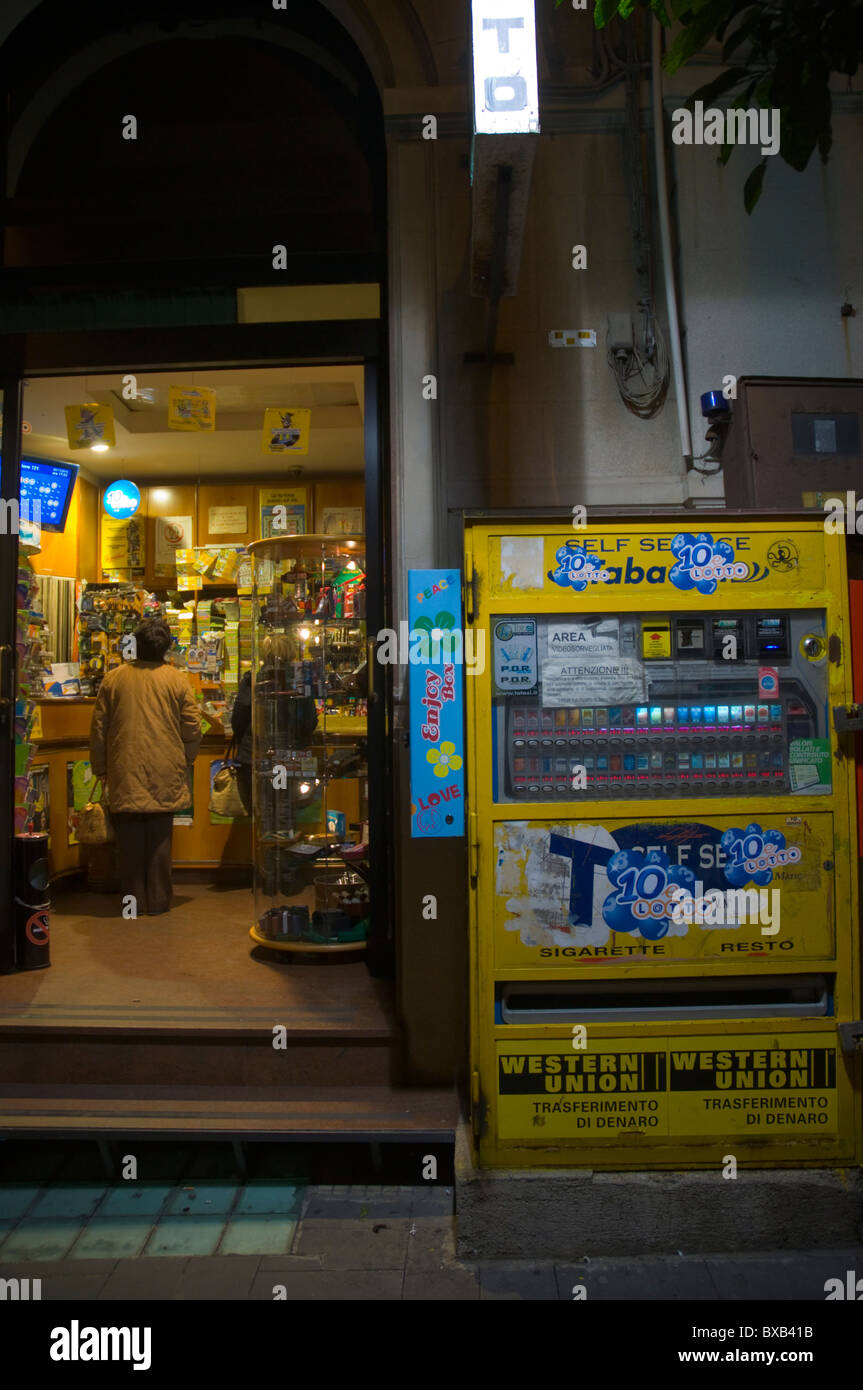Cigarette vending machine outside a corner shop central Messina city Sicily Italy Europe Stock Photo