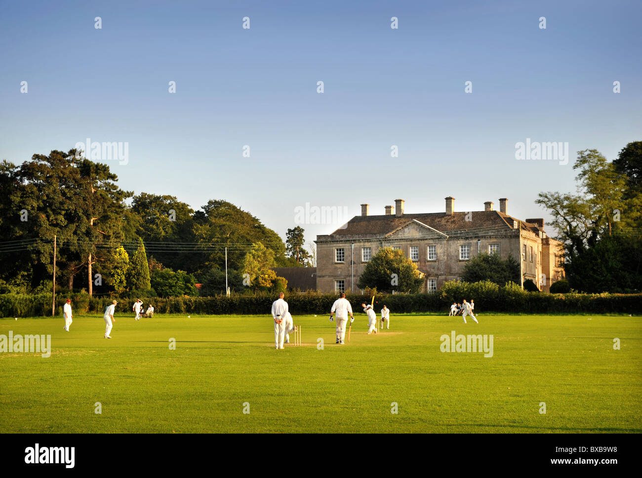 Evening at a village cricket match at North Nibley cricket ground Gloucestershire UK Stock Photo