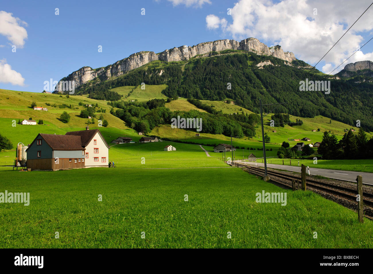 Farm house in the canton of Appenzell, Alpstein Mountains in the back, Canton Appenzell, Switzerland, Europe Stock Photo