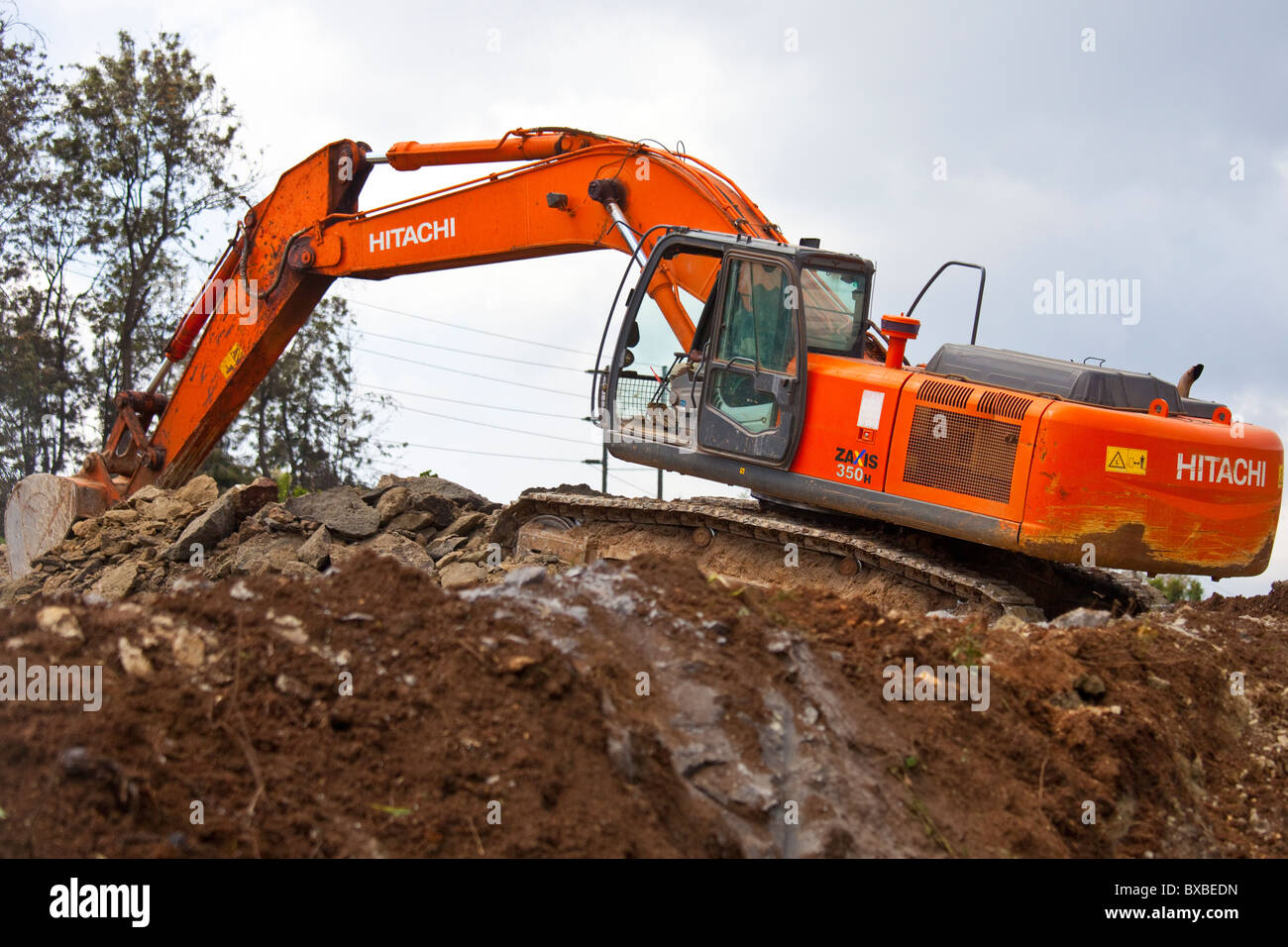 Excavator or digger heavy equipment working on highway construction in Nairobi, Kenya Stock Photo