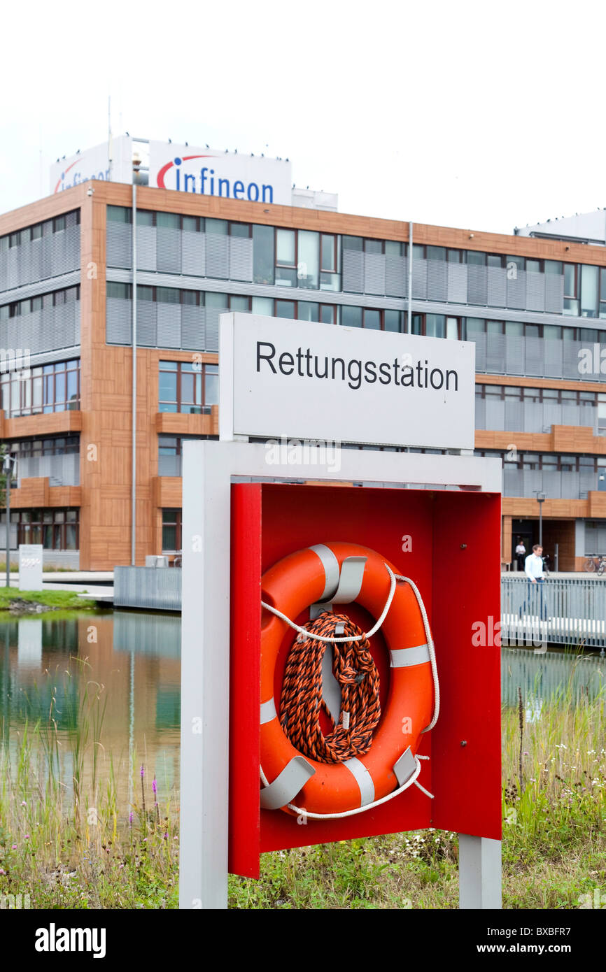 Life buoy at rescue station in front of the headquarters of Infineon Technologies AG, Neubiberg near Munich, Bavaria Stock Photo