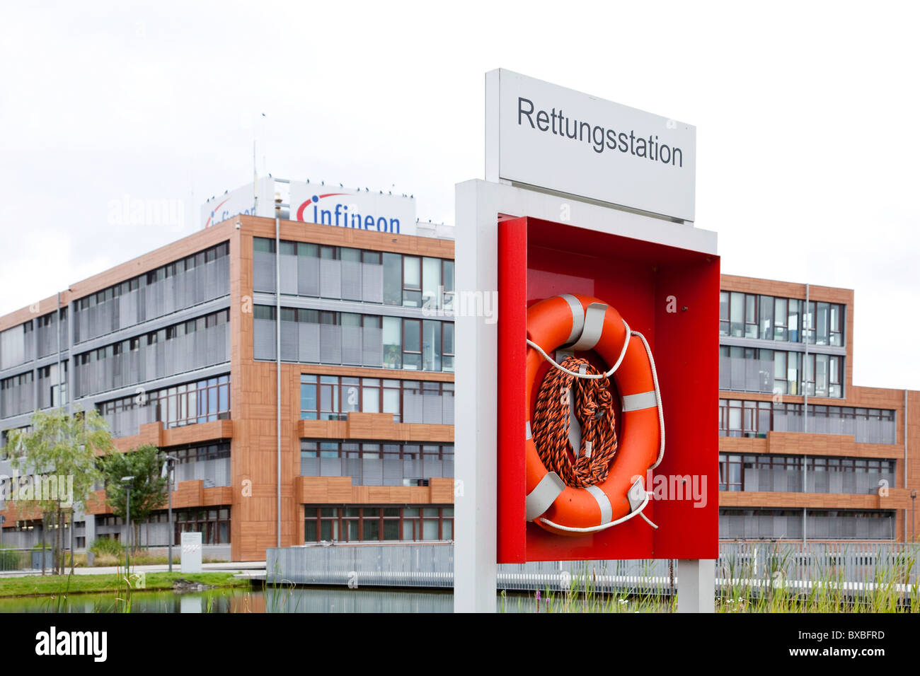 Life buoy at rescue station in front of the headquarters of Infineon Technologies AG, Neubiberg near Munich, Bavaria Stock Photo