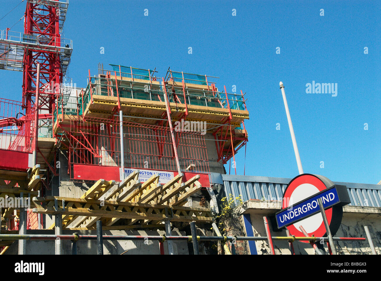 Construction work to modify Aldgate East Underground station London UK Stock Photo