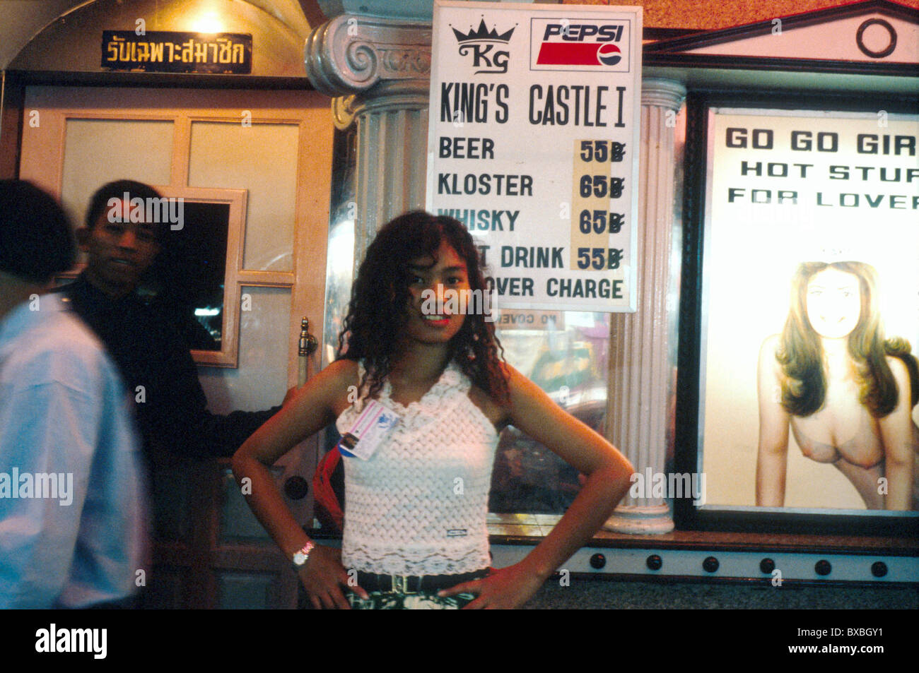 THAILAND YOUNG TEENAGE GIRL OUTSIDE A STRIP TEASE BAR IN BANGKOK Photo  ©Julio Etchart Stock Photo - Alamy