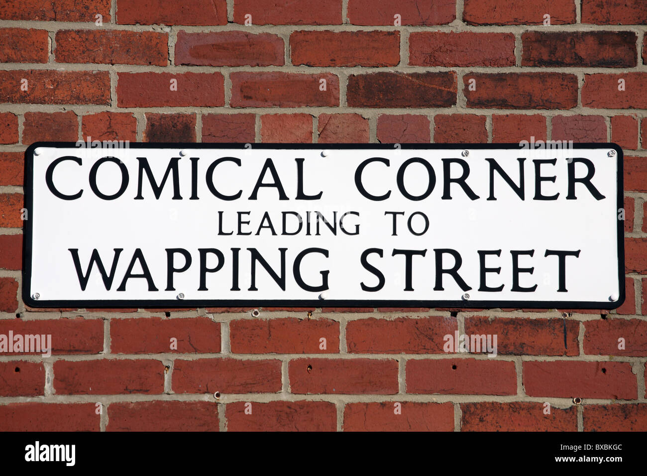 Amusing street sign Comical Corner Leading to Wapping Street, South Shields, Tyne and Wear, England, UK Stock Photo