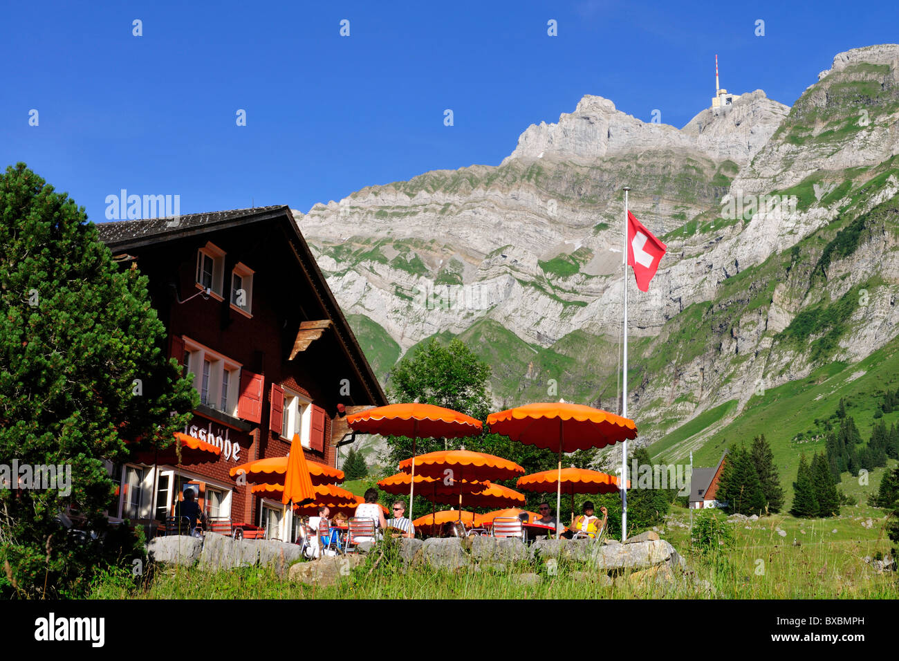 Restaurant on Schwaegalp Mountain in front of Saentis Mountain, the highest mountain in Alpstein Mountains, Canton of Appenzell Stock Photo