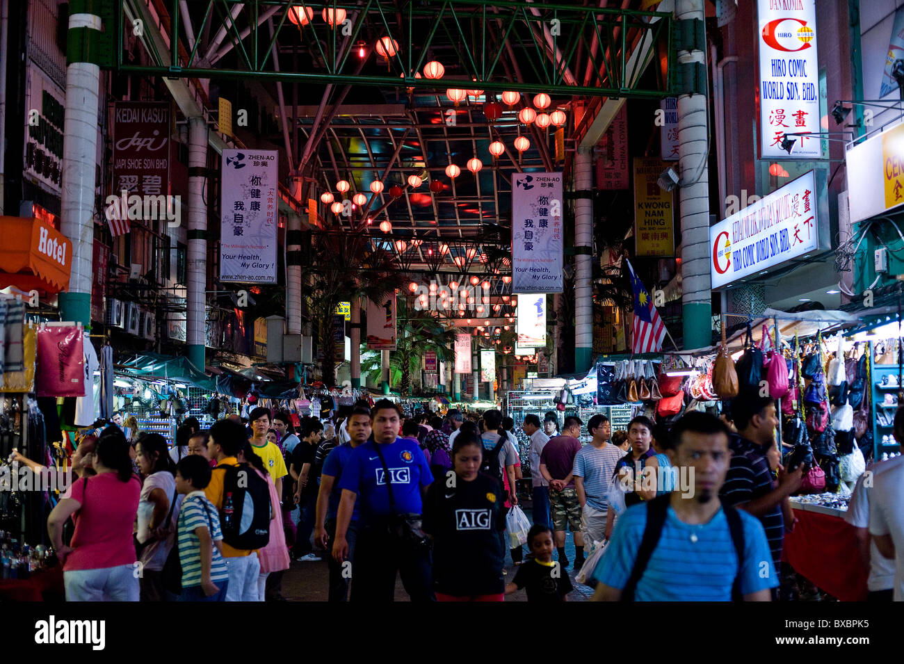 People in a street market at night in Kuala Lumpur. Stock Photo
