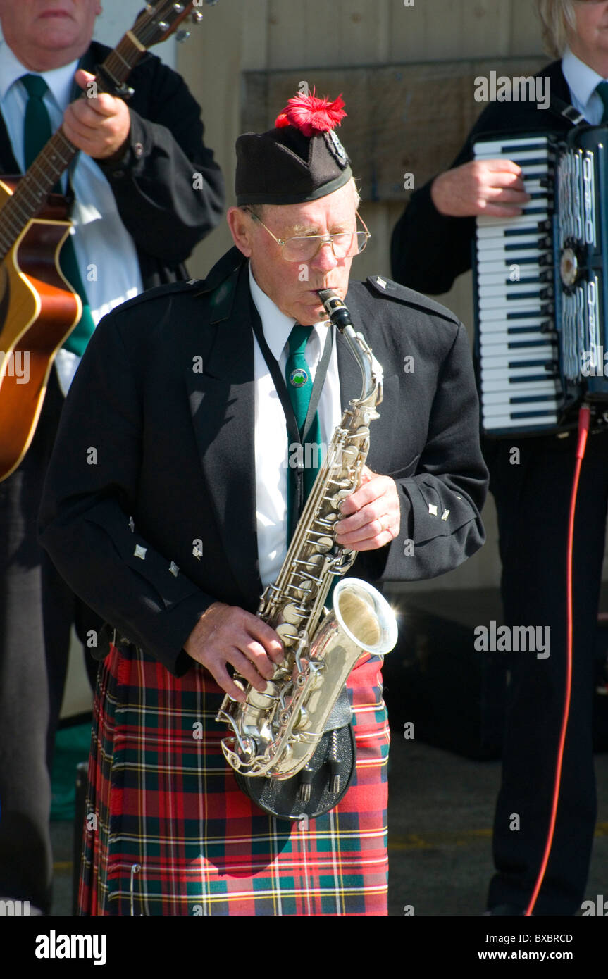 Performers with a Highland pipe band, Dunedin, New Zealand Stock Photo