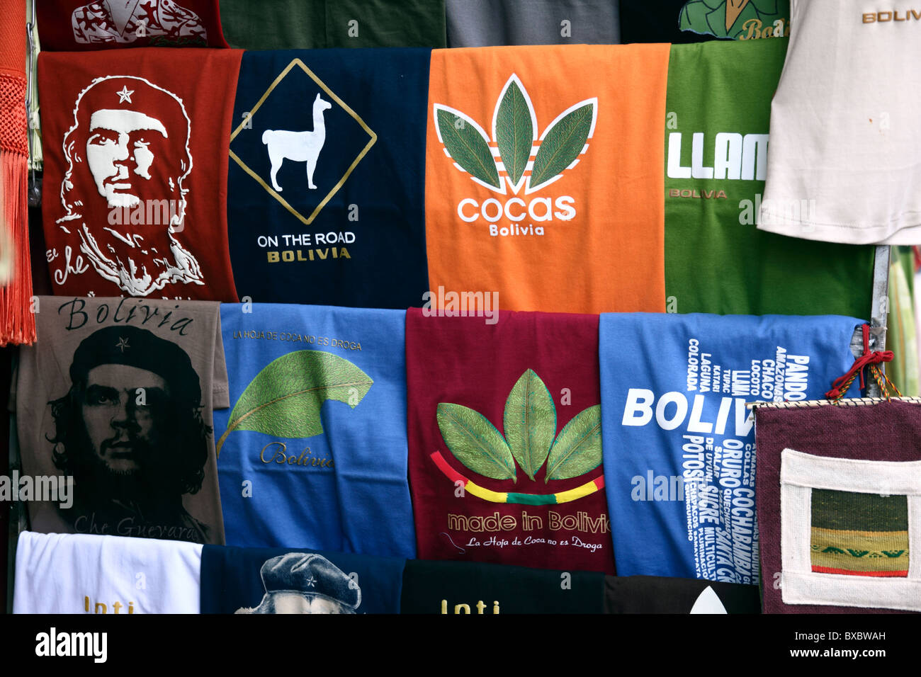 T-shirts with Che Guevara and coca leaves in form of Adidas logo for sale outside shop in tourist market, Calle Linares, La Paz, Bolivia Stock Photo