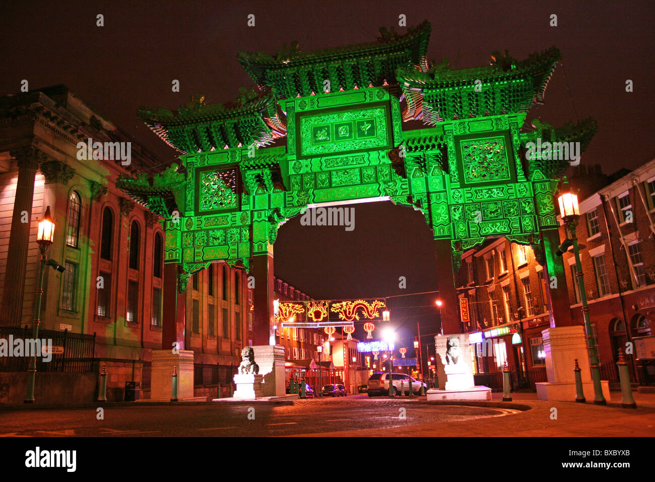 The Chinese Arch Illuminated At Night, Chinatown, Liverpool, Merseyside, UK Stock Photo