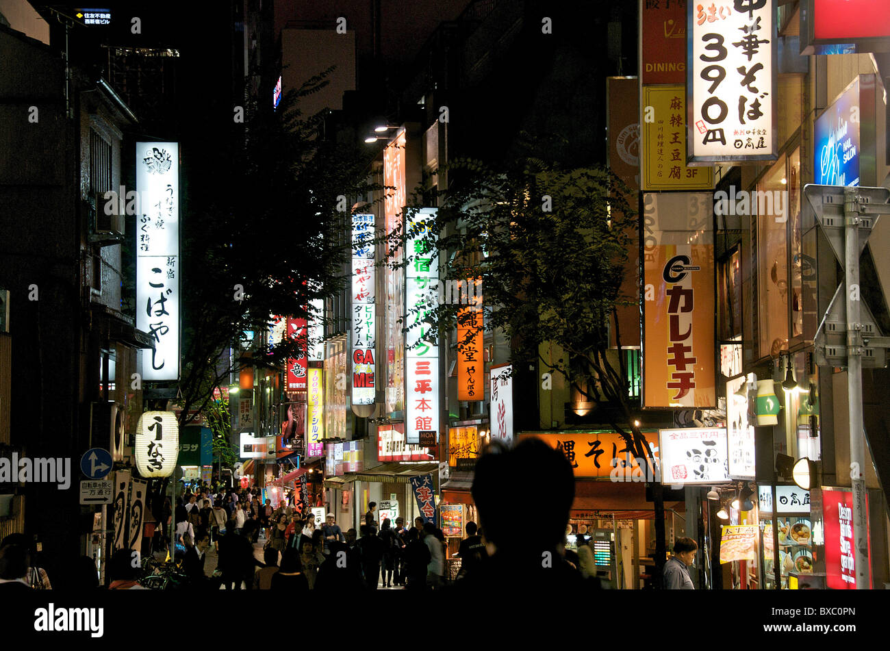 street scene by night, Shinjuku, Tokyo, Japan Stock Photo