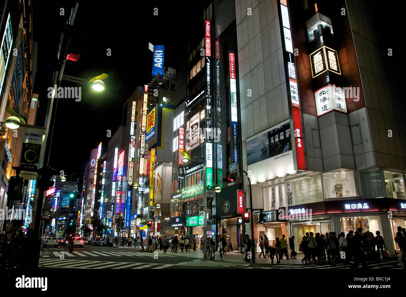 street scene by night, Shinjuku, Tokyo, Japan Stock Photo