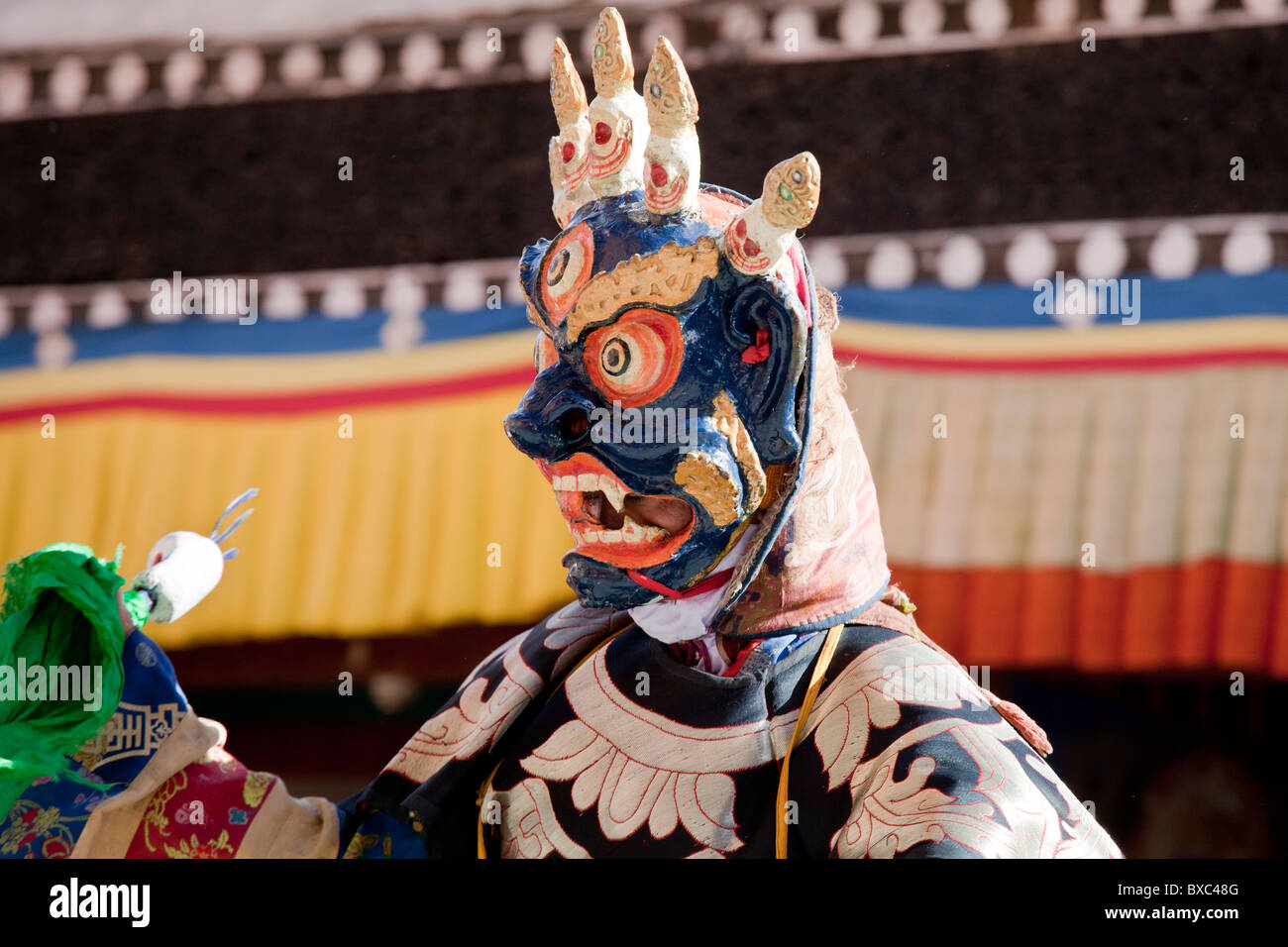 Buddhist mask dancers dressed as Mahakala performing during the Thiksey Gustor festival in Ladakh. Stock Photo