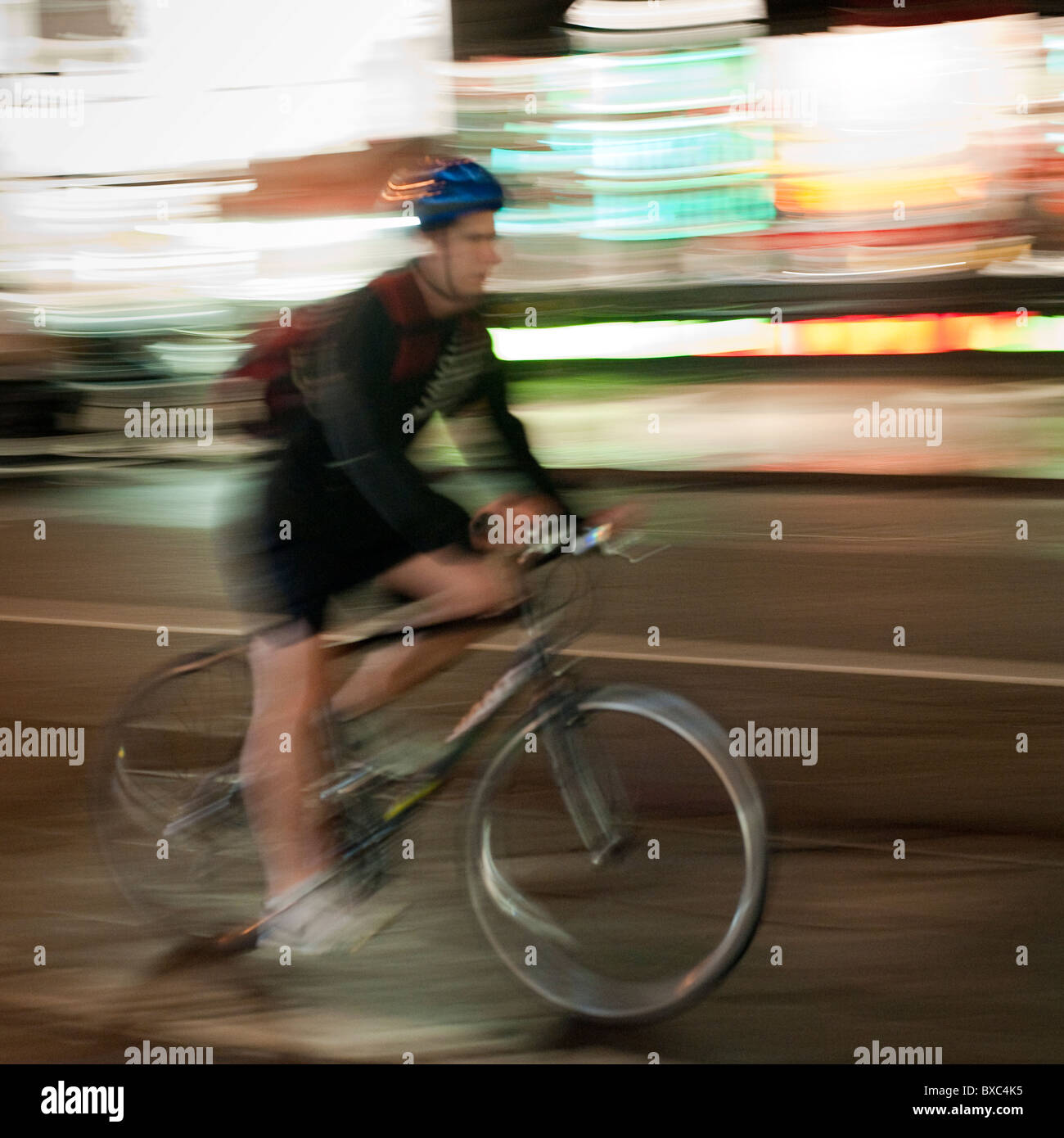 Man riding a bicycle in Manhattan, New York City, U.S.A. Stock Photo
