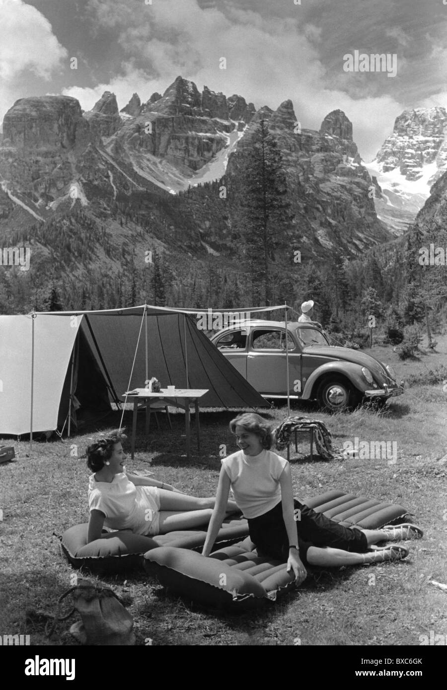 Tourism Camping Two Women On Air Mattress Outside Of A Tent Vw Beetle Dolomites South Tyrol Italy 1950s Additional Rights Clearences Not Available Stock Photo Alamy