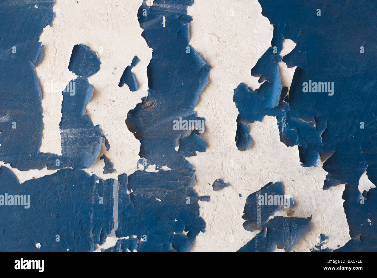 blue paint peeling off a concrete wall Stock Photo Alamy