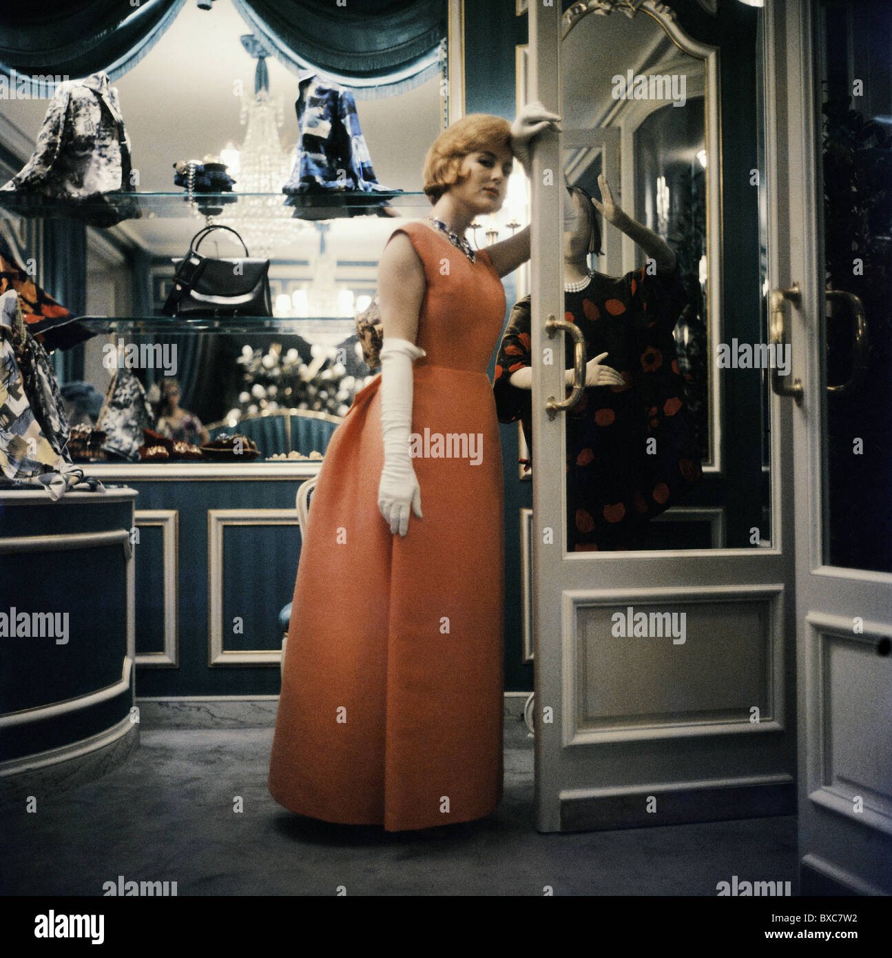 fashion, 1960s, evening dresses, woman in apricot-coloured evening dress, 1960s, 60s, 20th century, historic, historical, full length, white gloves, department store, shop, handbag, bags, ladies' fashion, 1950s, people, women, female, Additional-Rights-Clearences-Not Available Stock Photo