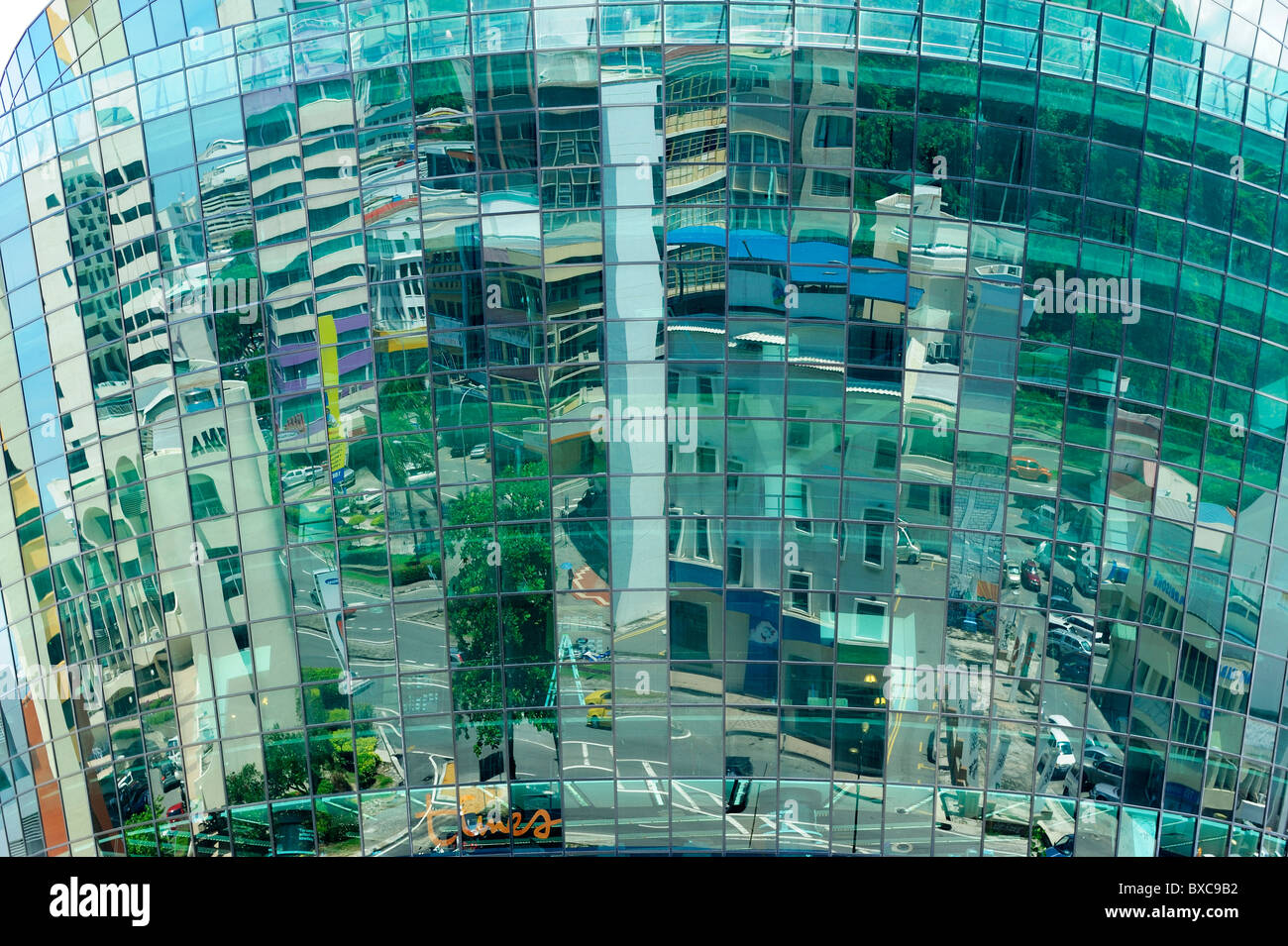 Reflections on glass fronted building in Kota Kinabalu, Sabah Stock