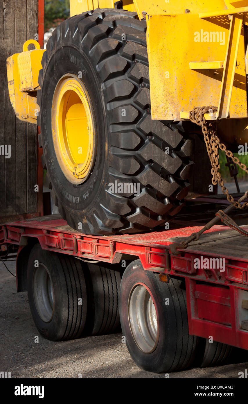 Front loader tire size compared to truck flatbed trailer tire size