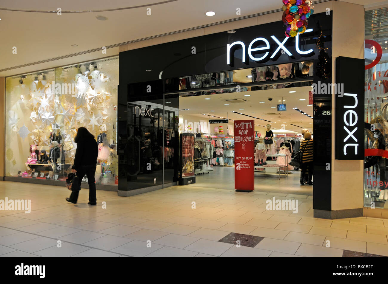 Next store in shopping mall Stock Photo Alamy