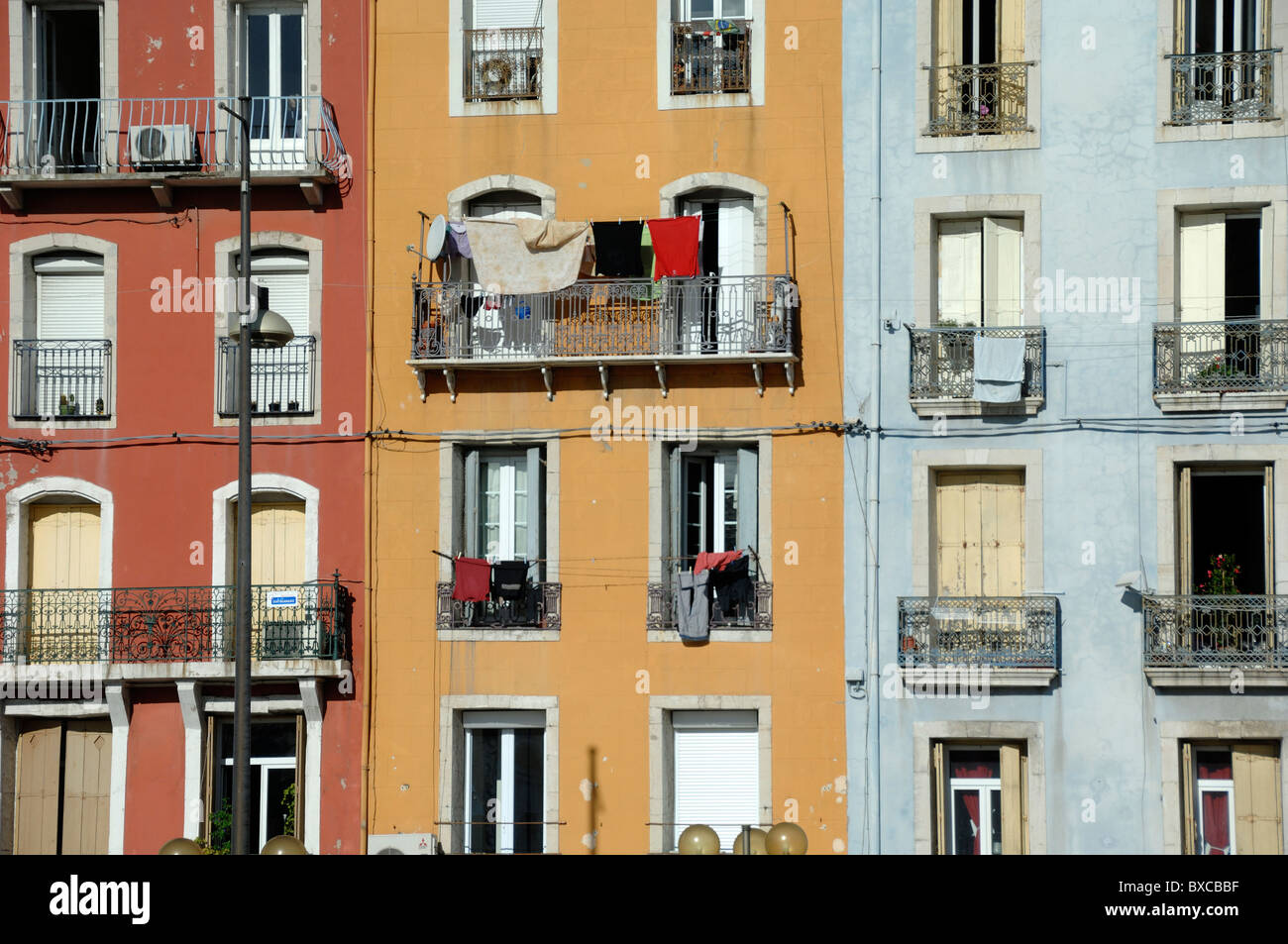 Colourful Facade & Window Patterns of Quayside or Canalside Houses Overlooking the Royal Canal at Sète Hérault France Stock Photo