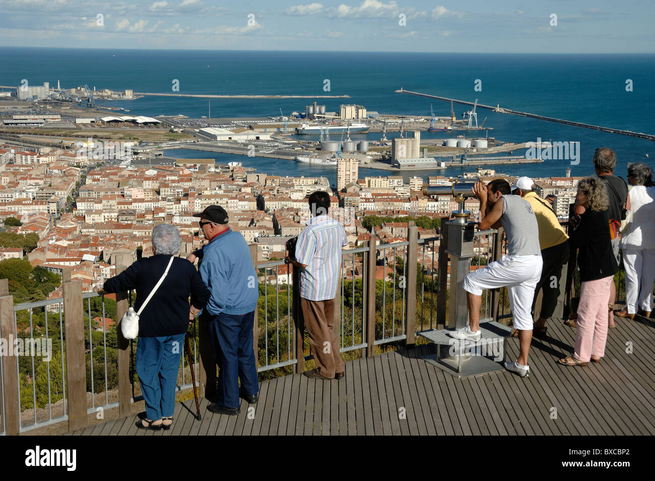 Tourists Admiring the View over Sète from the Mont Saint-Clair Viewpoint, Sète, Hérault, France Stock Photo