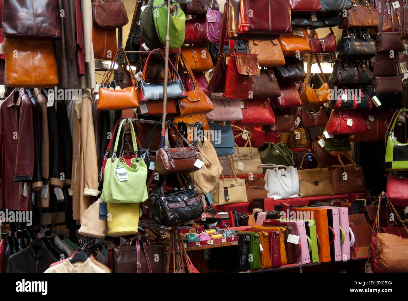 Leather handbags on a market stall, Florence, Italy Stock Photo - Alamy